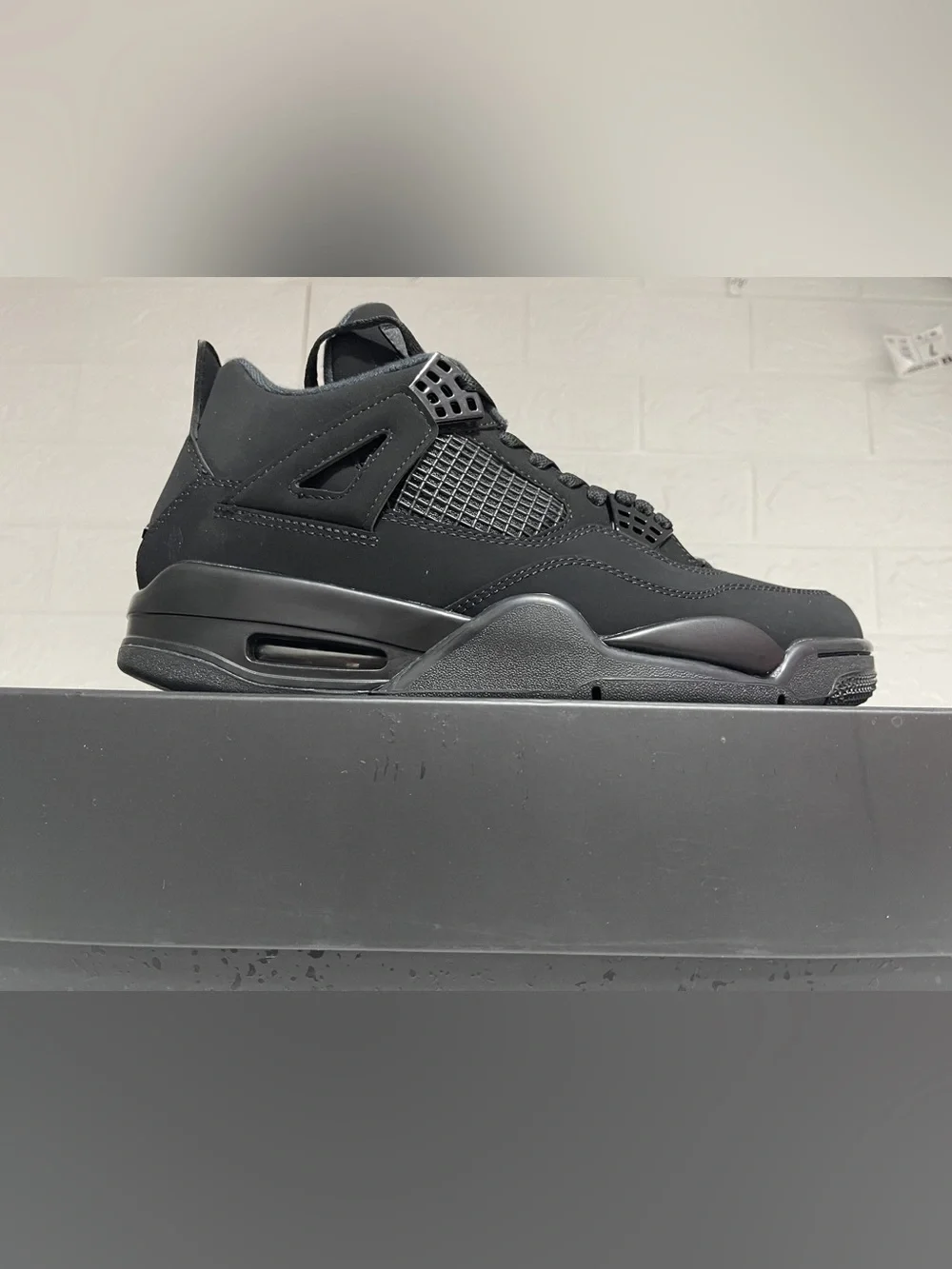 Air Jordan 4 All-Black Retro Basketball Sneaker